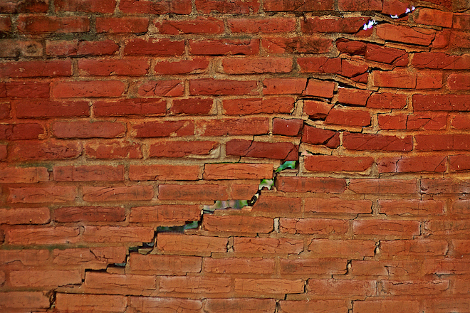 cracked-brick-wall